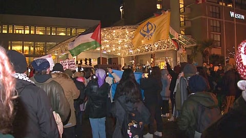 Protestors at the Westin Bayshore in December.