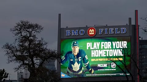 A sports betting ad on a billboard at BMO Field in Toronto.
