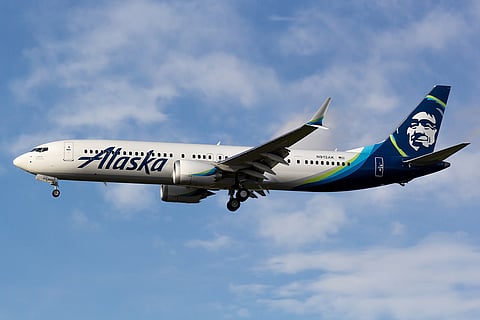 An Alaska Airlines 737 MAX 9 on final for Los Angeles International Airport's Runway 25L on a crew training flight in February 2021.