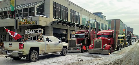 Truckers parked on Ottawa's Bank Street, during the Convoy in 2022. Upon review, the Federal Court ruled that the Trudeau Liberals had acted in an unjustified manner....