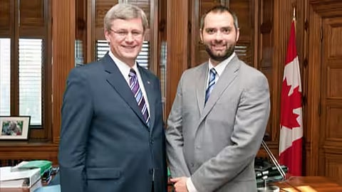 Ben Perrin (r) with Prime Minister Stephen Harper, when he was a legal adviser in Harmer's PMO. His recent book suggests he might now, give different advice