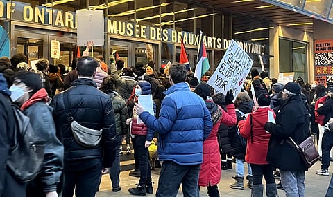 Pro-Palestine protesters gathered outside the Art Gallery of Ontario on Saturday. 