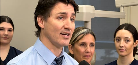 Prime Minister Justin Trudeau, pictured here at the Southern Alberta Institute of Technology,  won’t back down on the carbon tax. Elmira Aliakbari and Julio Mejia from the Fraser Institute say he should come clean about the real costs