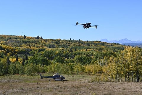 Drone and helicopter testing being performed by Alberta Wildfire personnel.
