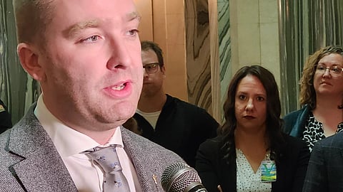 Minister of Education Jeremy Cockrill speaks to reporters while Sask Teachers Federation President Samatha Becotte looks (March 7, 2024)