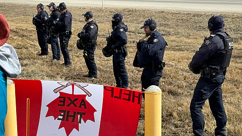 Police separate carbon tax protestors Tuesday 