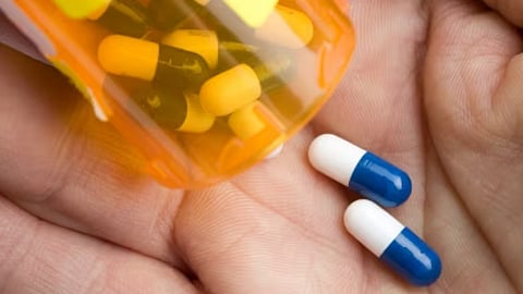 Pouring pills 