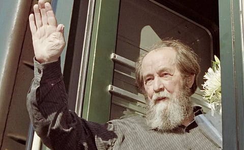 Russian dissident writer and Nobel prize winner Aleksandr Solzhenitsyn looks out from a train, in Vladivostok, summer 1994, before departing on a journey across Russia. Solzhenitsyn had returned to Russia after nearly 20 years in exile. As writer Paul Forseth points out, his critique of the moral condition of the West made nearly 50 years ago, now seems prophetic.