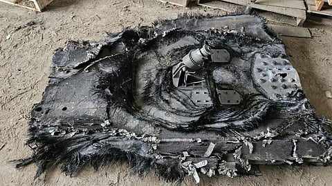 Barry and Cody Sawchuk found this 100-pound piece of space junk on April 28 in their field near Ituna, Sask.