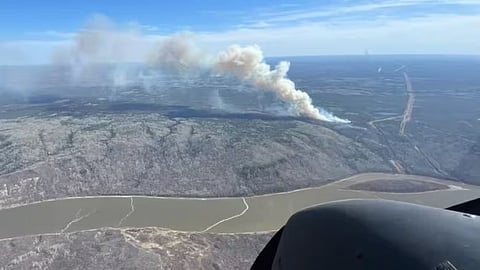 A wildfire burning near Fort McMurray, AB, at 3:30 p.m. on Friday, May 10, 2024. 