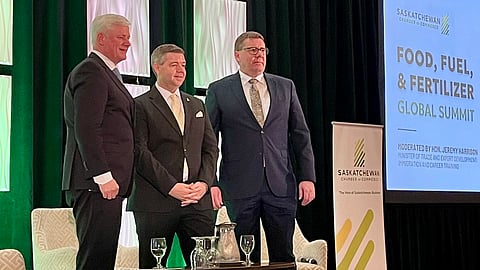 Stephen Harper, Trade Minister Jeremy Harrison, and Premier Scott Moe stood together at the Food, Fuel, & Fertilizer Global Summit in Regina May 6, 2024