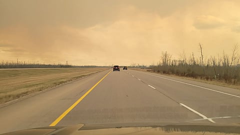 People fleeing from the wildfire that is nearing Fort McMurray, AB. 