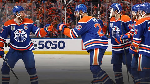 Oilers’ captain Connor McDavid congratulates D-Man Darnell Nurse after a second period goal.