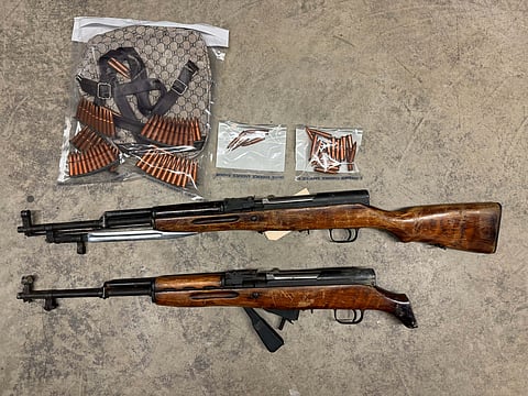These guns and bullets were seized after an arrest of three men by RCMP on June 11