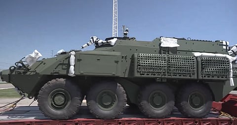 WATCH: First of 50 military tanks loaded in trucks in Ontario to be sent to Ukraine 