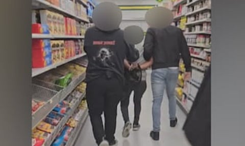 Dora Wood says she took this video when store security detained a woman accused of shoplifting at the Dollarama on Portage Avenue near Donald Street in downtown Winnipeg on Wednesday. CBC has altered the video to conceal faces and profanities. Wood says that as the woman was indigenous, she should have been handled in a different manner.