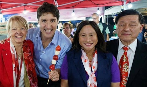 Trudeau caught cropping China Communist Party affiliate from official photos 
