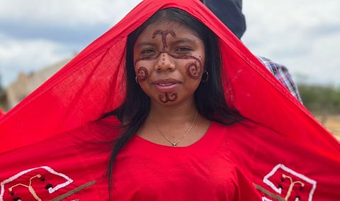 A young member of the indigenous Wayúu people in traditional dress.