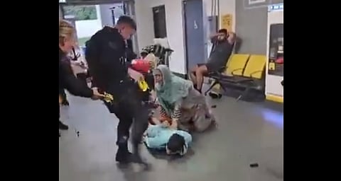 British cop kicks suspect in face
