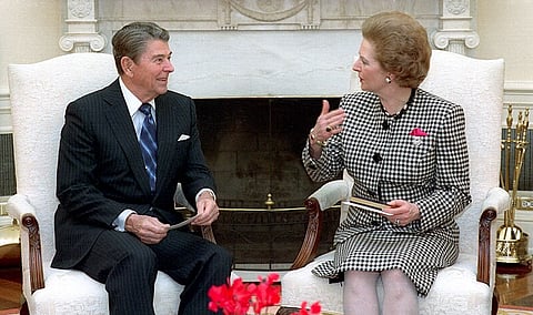 US President Ronald Reagan, with British Prime MInister Margaret Thatcher, in the Oval Office. (November 16th, 1988.) With Pope John  Paul II, their great achievement was to confront the USSR, leading first to the fall of the Berlin Wall and later to the dissolution of the USSR and the end of the Cold War. Writer Tony Barber laments the lack of moral leadership in an increasingly dangerous world.