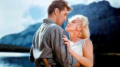 Marilyn Monroe and Robert Mitchum in ‘River of No Return’ in 1954.