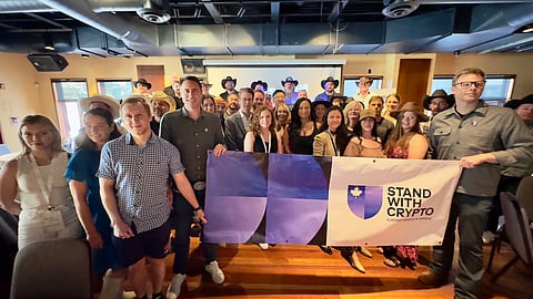 AMONG FRIENDS: Technology Minister Nate Glubish (somewhere in centre) promotes Blockchain government at Canadian Blockchain Consortium’s trade mission in Calgary.