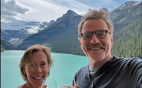 Bryan Cranston and his wife enjoy the view from their room at Chateau Lake Louise