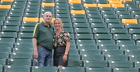 Larry and Deb Thompson pictured in Section H in Commonwealth Stadium. 
