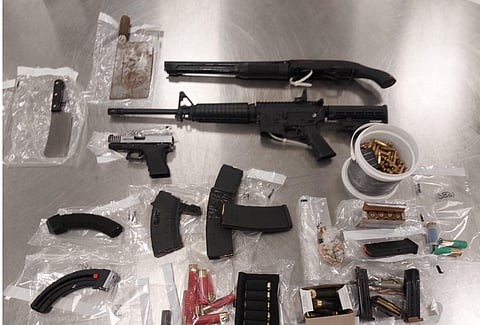 Two Calgary men charged after stolen motorcycle investigation uncovers drugs, weapons cache

