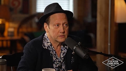 Rob Schneider told the Tucker Carlson Show he could apologize for not being more present as a parent when his children were young but not for his comedy act cut short in Regina last June. 