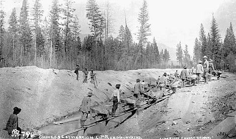 Chinese workers building the CanadianPacific Railway circa 1881.
