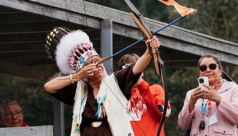 Opaskwayak Cree Nation Chief Maureen Brown shoots the flaming arrow as part of the opening ceremonies at the community's annual Opaskwayak Indigenous Days celebration, the first woman to do so. Cory Morgan makes the case that Western independence would work well for Indigenous people