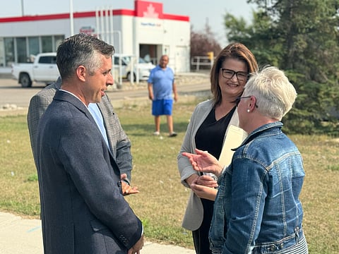 Jared Clarke, left, campaigning with Saskatchewan leader Carla Beck. Columnist Linda Slobodian takes a dim view of Clarke's position that boys who identify as girls should use the girls' change rooms