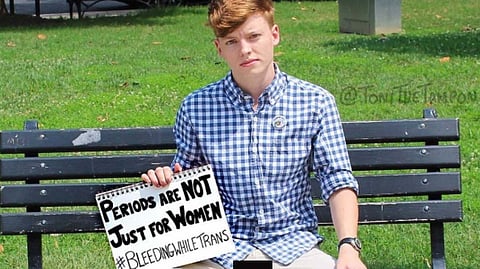 Trans person on bench 