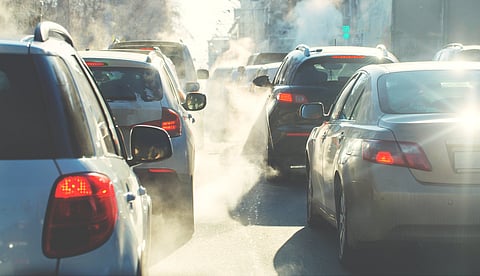 Vehicles sitting in traffic