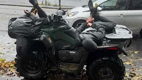 Men tied on quad bike Lancashire 