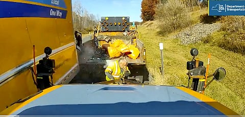 WATCH: Miraculous escape by New York road work as semi nearly hits him