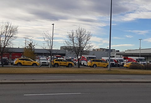 Taxis preparing to deliver postal carriers