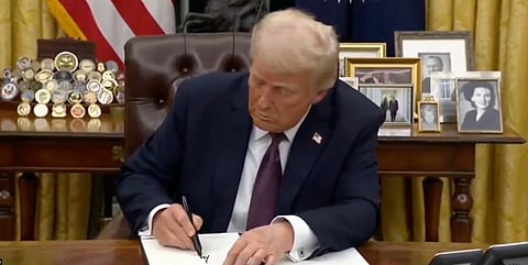 U.S. President Donald Trump signing executive orders 