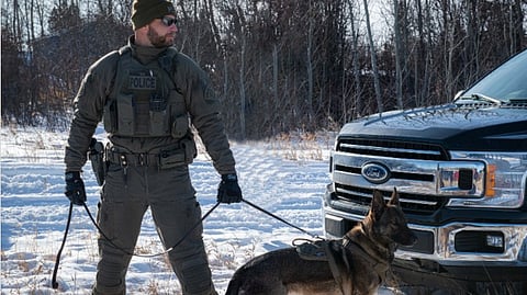 Sask RCMP officer with his canine partner