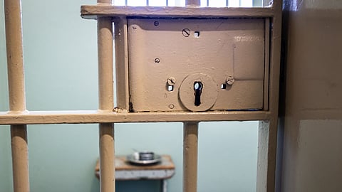 Exterior view of a jail cell door 