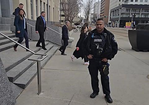 Prime Minister Mark Carney leaves the QEII building in Edmonton after speaking with Premier Danielle Smith on March 20, 2025 