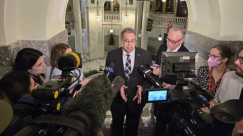 Alberta NDP leader Naheed Nenshi speaks with reporters in the Alberta Legislature 