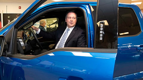Jason Kenney and the blue Dodge. Writer Chris Nelson observes that the image it evokes was a little contrived...