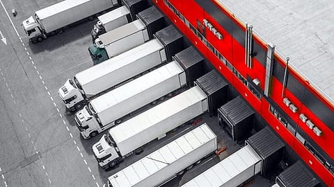 Trucks unloading at a warehouse. To boost prosperity, Prime Minister Mark Carney has promised to remove barriers to internal trade by July 1