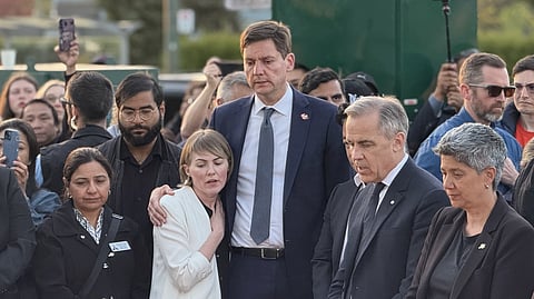 Premier David Eby stands in solidarity with mourners following the Lapu Lapu Day festival attack in Vancouver.