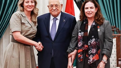 Handholding photo on West Bank trip costs cabinet minister her seat
