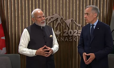 Modi and Carney