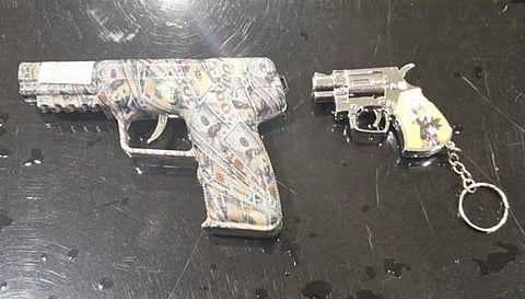Gun-shaped lighter