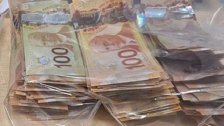 Calgary man charged after $58,000 in counterfeit bills seized